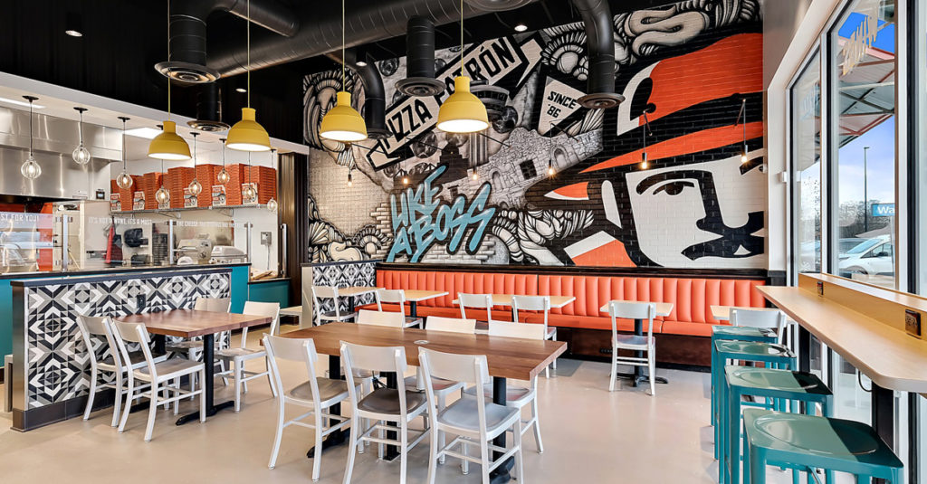 Interior of new Pizza Patron showcasing colorful mural